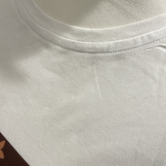 White cap sleeve tee with LV logo. No care tags. Feels like rayon/cotton blend. - Picture 4 of 11